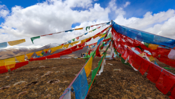 Tibetan prayer flags over Himalayas