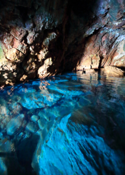 blue water in a cave on the Greek islands