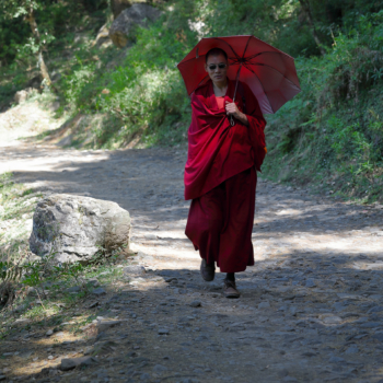 monk with ambrella
