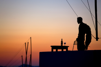 silhouette of an archangel with wine