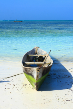 wooden boat on the banks of Zanzibar, Tanzania