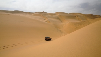 lonely car among the dunes of the Namib desert
