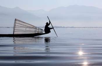 paddling on the Inle Lake in the morning fog, Myanmar 