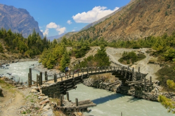 thin wooden bridge in the Himalayas trekking rooth, Nepal